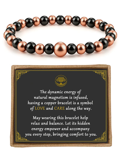Magnetic copper bead bracelet with central accent bead displayed with Pealicious love and care gift card