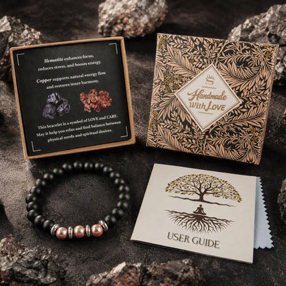 Hematite and copper beaded bracelet gift set with botanical gift box, guide, and cloth